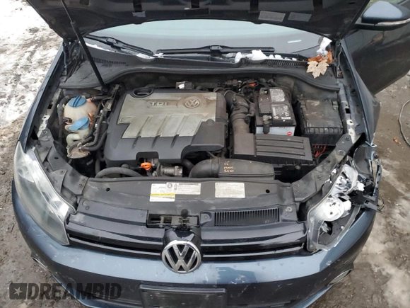 2013 Volkswagen Golf TDI w/Sunroof & Nav z VIN WVWNM7AJ6DW040886, wystawiony jako Copart lot #81915724 z przebiegiem 186 427 mil mil oraz Szkoda całkowita • Salvage title. Historia ofert i sprzedaży dostępna na DreamBid. Obrazek 12.