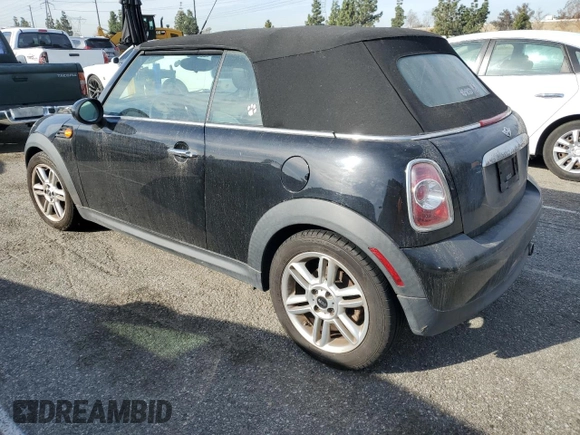 2012 MINI Convertible with VIN WMWZN3C59CT135270, listed as a Copart auction lot 48468785 with 81,726 mi miles and Clean Title. Bid and sale history available at DreamBid. Image 2.