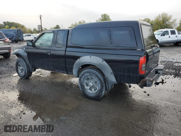 2002 Nissan Frontier XE with VIN 1N6ED26Y52C361595, listed as a Copart auction lot 77796414 with 170,555 mi miles and Salvage title. Bid and sale history available at DreamBid. Image 2.