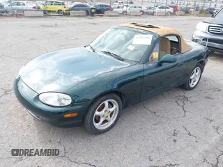 1999 Mazda MX-5 Miata z VIN JM1NB3531X0102955, wystawiony jako IAAI lot #42223214 z przebiegiem Nie podano mil oraz . Historia ofert i sprzedaży dostępna na DreamBid. Obrazek 2.