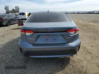 2022 Toyota Corolla Hybrid LE with VIN JTDEAMDE0N3003048, listed as a Copart auction lot 50637085 with 67,990 mi miles and Salvage Title. Bid and sale history available at carsss.com. Image 6.