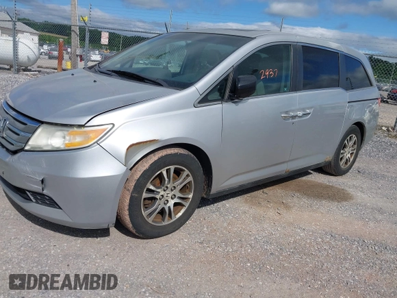 2012 Honda Odyssey EX-L with VIN 5FNRL5H63CB063815, listed as a IAAI auction lot 42302937 with 377,768 mi miles and . Bid and sale history available at DreamBid. Image 2.