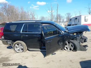2015 Chevrolet Tahoe LTZ with VIN 1GNSKCKC6FR190314, listed as a IAAI auction lot 41672237 with 176,439 mi miles. Bid and sale history available at carsss.com. Image 13.