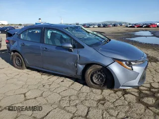 2021 Toyota Corolla LE with VIN 5YFEPMAE4MP267852, listed as a Copart auction lot 49284315 with 27,157 mi miles and Salvage Title. Bid and sale history available at DreamBid. Image 4.