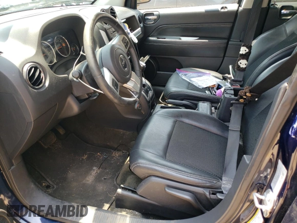 2016 Jeep Compass Latitude with VIN 1C4NJDEB4GD758009, listed as a Copart auction lot 60704745 with 143,393 mi miles and Salvage title. Bid and sale history available at DreamBid. Image 7.