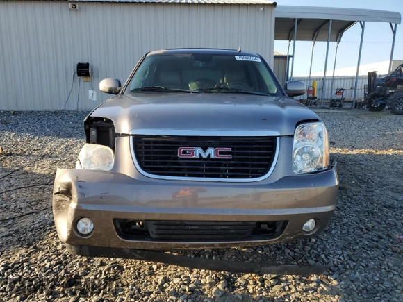 2011 GMC Yukon SLT with VIN 1GKS1CE05BR270876, listed as a Copart auction lot 75906934 with 215,964 mi miles and Salvage Title. Bid and sale history available at carsss.com. Image 5.