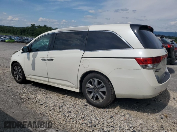 2014 Honda Odyssey Touring with VIN 5FNRL5H94EB080815, listed as a Copart auction lot 65244325 with 153,314 mi miles and Salvage title. Bid and sale history available at DreamBid. Image 2.