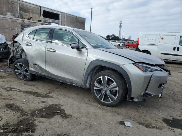 2022 Lexus UX with VIN JTHX3JBH6N2051446, listed as a Copart auction lot 42404335 with 26,866 mi miles and Salvage Title. Bid and sale history available at carsss.com. Image 4.