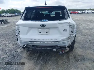 2021 Kia Sorento LX z VIN 5XYRG4LC6MG022343, wystawiony jako IAAI lot #42139411 z przebiegiem 67 266 mil mil oraz . Historia ofert i sprzedaży dostępna na DreamBid. Obrazek 6.