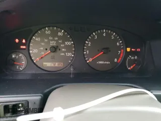 2000 Infiniti G20 Luxury z VIN JNKCP11A5YT303404, wystawiony jako Copart lot #82801234 z przebiegiem 178 185 mil mil oraz Tytuł czysty. Historia ofert i sprzedaży dostępna na DreamBid. Obrazek 9.