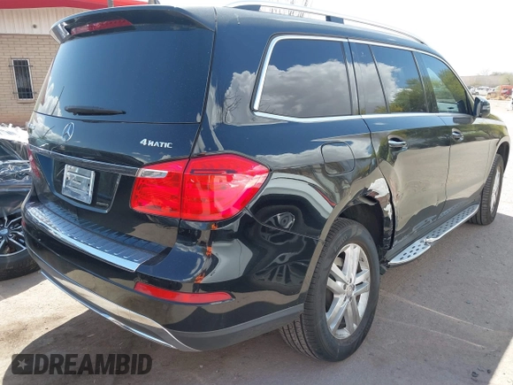 2014 Mercedes-Benz GL 450 z VIN 4JGDF7CE1EA342408, wystawiony jako IAAI lot #41968441 z przebiegiem 120 459 mil mil oraz . Historia ofert i sprzedaży dostępna na DreamBid. Obrazek 4.