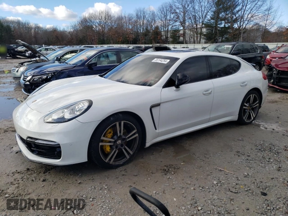 2014 Porsche Panamera z VIN WP0AA2A74EL010108, wystawiony jako Copart lot #85194254 z przebiegiem 77 568 mil mil oraz Czysty tytuł • Clean title. Historia ofert i sprzedaży dostępna na DreamBid. Obrazek 1.