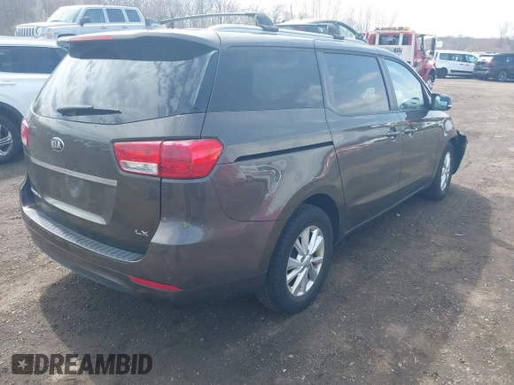 2016 Kia Sedona LX with VIN KNDMB5C11G6158934, listed as a IAAI auction lot 41908323 with 105,888 mi miles and . Bid and sale history available at carsss.com. Image 4.