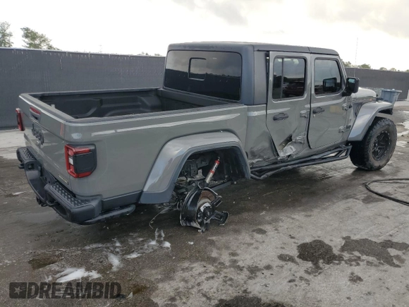 2021 Jeep Gladiator Sport S с VIN 1C6JJTAG1ML562354, выставлен на аукционе Copart как лот 54850185 с пробегом 67 473 миль миль и На запчасти • Non repairable. История ставок и продаж доступна на DreamBid. Изображение 3.