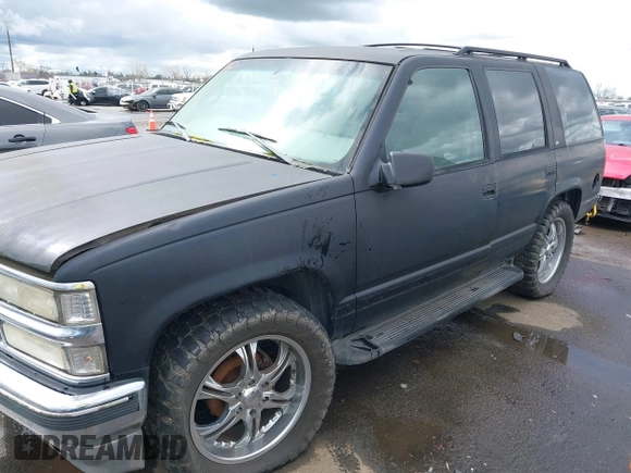 1999 Chevrolet Tahoe Z71 with VIN 1GNEK13R1XJ425996, listed as a IAAI auction lot 41798943 with 203,106 mi miles and . Bid and sale history available at DreamBid. Image 2.