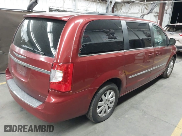 2013 Chrysler Town & Country Touring with VIN 2C4RC1BG3DR792929, listed as a IAAI auction lot 42185342 with Not Provided miles and . Bid and sale history available at DreamBid. Image 4.