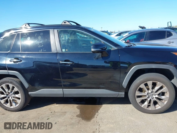 2019 Toyota RAV4 Limited with VIN JTMN1RFV5KD506624, listed as a IAAI auction lot 41657432 with 93,416 mi miles. Bid and sale history available at carsss.com. Image 14.