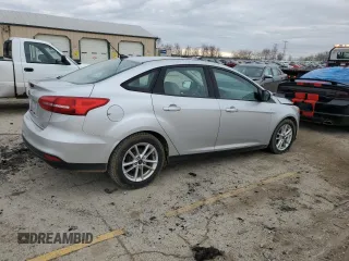 2015 Ford Focus SE with VIN 1FADP3F29FL370335, listed as a Copart auction lot 51010975 with 215,026 mi miles and Clean Title. Bid and sale history available at DreamBid. Image 3.