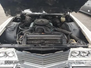 1974 Cadillac Eldorado z VIN 6L67S4Q408046, wystawiony jako Copart lot #77112024 z przebiegiem 97 414 mil mil oraz Szkoda całkowita • Salvage title. Historia ofert i sprzedaży dostępna na DreamBid. Obrazek 11.