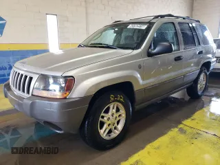 2004 Jeep Grand Cherokee Laredo z VIN 1J4GW48S24C327184, wystawiony jako Copart lot #53702515 z przebiegiem 151 411 mil mil oraz Tytuł czysty. Historia ofert i sprzedaży dostępna na DreamBid. Obrazek 1.