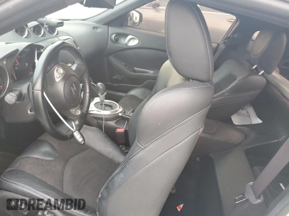 2014 Nissan 370Z Touring with VIN JN1AZ4EH0EM636520, listed as a Copart auction lot 73661434 with 0 mi miles and Salvage Title. Bid and sale history available at carsss.com. Image 7.