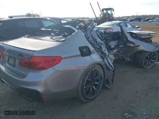 2019 BMW M5 Competition with VIN WBSJF0C58KB285959, listed as a IAAI auction lot 41867705 with 0 mi miles. Bid and sale history available at carsss.com. Image 4.