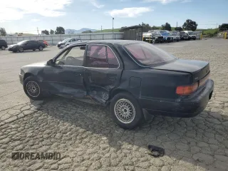 1993 Toyota Camry LE with VIN JT2SK12E4P0112014, listed as a Copart auction lot 52822095 with 249,458 mi miles and Salvage Title. Bid and sale history available at carsss.com. Image 2.