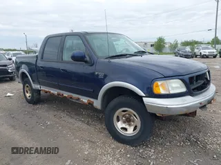 2003 Ford F-150 XLT with VIN 1FTRW08L63KD55851, listed as a IAAI auction lot 42359388 with Not provided miles and . Bid and sale history available at DreamBid. Image 1.