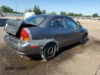 2005 Hyundai Accent GLS with VIN KMHCG45C05U605716, listed as a Copart auction lot 69445324 with 158,082 mi miles and Clean Title. Bid and sale history available at carsss.com. Image 3.