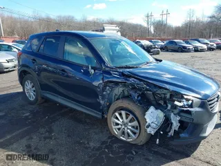 2016 Mazda CX-5 Touring with VIN JM3KE4CY6G0717393, listed as a IAAI auction lot 41596084 with 150,774 mi miles. Bid and sale history available at carsss.com. Image 18.