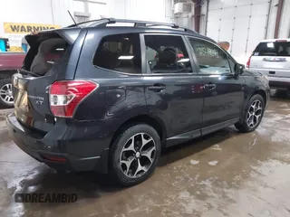 2014 Subaru Forester 2.0XT Touring with VIN JF2SJGPC7EH425711, listed as a IAAI auction lot 41549382 with 119,039 mi miles. Bid and sale history available at carsss.com. Image 4.