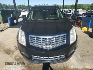 2013 Cadillac SRX Premium Collection z VIN 3GYFNEE37DS622065, wystawiony jako Copart lot #57468065 z przebiegiem 108 796 mil mil oraz Szkoda całkowita • Salvage title. Historia ofert i sprzedaży dostępna na DreamBid. Obrazek 5.