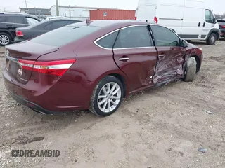2015 Toyota Avalon Limited with VIN 4T1BK1EB7FU167777, listed as a IAAI auction lot 41457339 with 98,239 mi miles and . Bid and sale history available at DreamBid. Image 4.