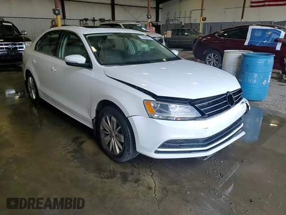 2015 Volkswagen Jetta SE with VIN 3VWD17AJ5FM256703, listed as a Copart auction lot 62699375 with 130,247 mi miles and Salvage title. Bid and sale history available at DreamBid. Image 13.