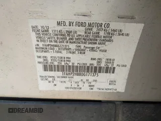2013 Ford Taurus SEL with VIN 1FAHP2H88DG171375, listed as a IAAI auction lot 42110345 with 169,000 mi miles and . Bid and sale history available at DreamBid. Image 9.