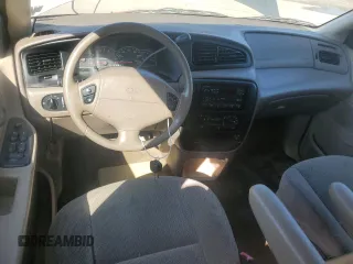 1999 Ford Windstar LX with VIN 2FMZA5144XBB45484, listed as a Copart auction lot 69388784 with Not Provided miles and Salvage Title. Bid and sale history available at carsss.com. Image 8.