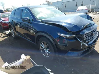 2017 Mazda CX-9 Touring z VIN JM3TCBCY3H0139866, wystawiony jako IAAI lot #41849281 z przebiegiem 135 259 mil mil oraz . Historia ofert i sprzedaży dostępna na DreamBid. Obrazek 1.