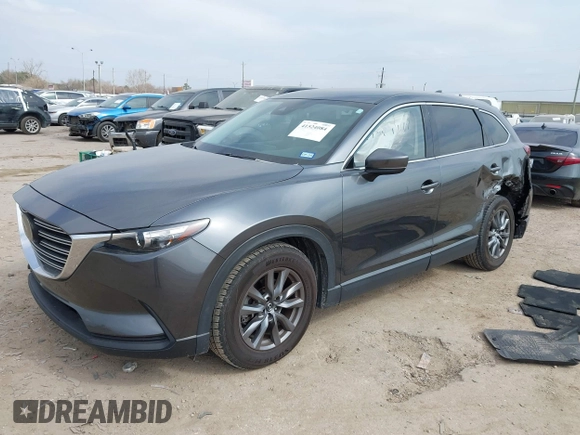2021 Mazda CX-9 Touring with VIN JM3TCACY7M0516185, listed as a IAAI auction lot 41524084 with 53,084 mi miles. Bid and sale history available at carsss.com. Image 17.