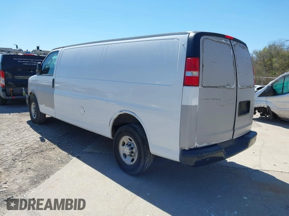 2017 Chevrolet Express Cargo Van with VIN 1GCWGBFFXH1139037, listed as a IAAI auction lot 41784999 with 198,660 mi miles. Bid and sale history available at carsss.com. Image 3.