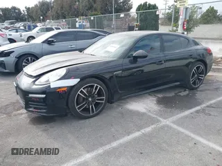 2015 Porsche Panamera 4 с VIN WP0AA2A75FL003203, выставлен на аукционе IAAI как лот 41080482 с пробегом 91 124 миль миль и . История ставок и продаж доступна на DreamBid. Изображение 18.