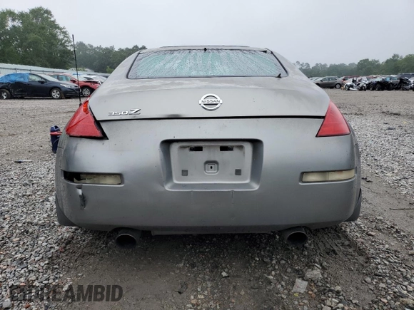 2003 Nissan 350Z Performance z VIN JN1AZ34D33T106988, wystawiony jako Copart lot #57933985 z przebiegiem 203 959 mil mil oraz Szkoda całkowita • Salvage title. Historia ofert i sprzedaży dostępna na DreamBid. Obrazek 6.