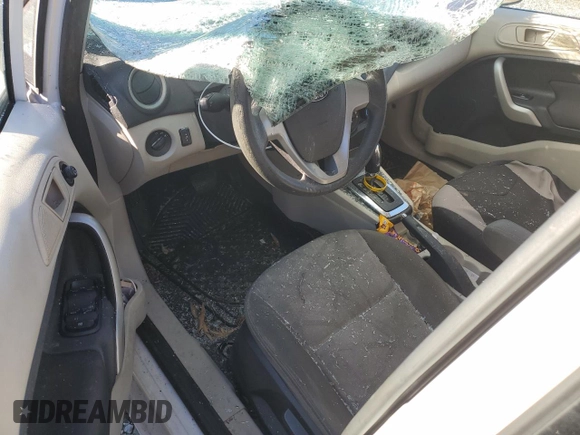 2012 Ford Fiesta SE with VIN 3FADP4BJ3CM101275, listed as a Copart auction lot 85560904 with 101,169 mi miles and Salvage Title. Bid and sale history available at DreamBid. Image 8.