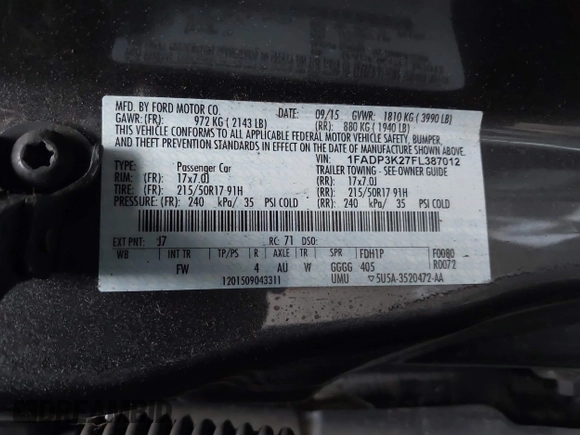 2015 Ford Focus SE with VIN 1FADP3K27FL387012, listed as a IAAI auction lot 42100945 with 85,588 mi miles. Bid and sale history available at carsss.com. Image 9.