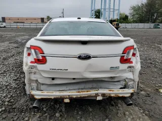 2012 Ford Taurus SHO with VIN 1FAHP2KT2CG141879, listed as a Copart auction lot 56558365 with 105,230 mi miles and Salvage title. Bid and sale history available at DreamBid. Image 6.