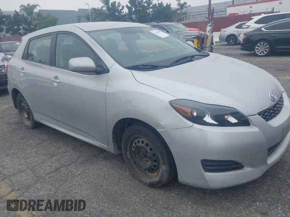 2009 Toyota Matrix with VIN 2T1KU40E49C130897, listed as a IAAI auction lot 42164096 with 140,273 mi miles. Bid and sale history available at carsss.com. Image 6.