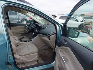 2013 Ford Escape SEL with VIN 1FMCU0HX1DUD56986, listed as a IAAI auction lot 42026927 with 180,318 mi miles. Bid and sale history available at carsss.com. Image 5.