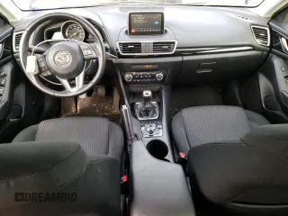 2015 Mazda 3 i Touring with VIN 3MZBM1L78FM235597, listed as a Copart auction lot 51717005 with 57,186 mi miles and Salvage title. Bid and sale history available at DreamBid. Image 8.