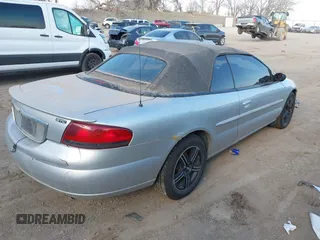 2004 Chrysler Sebring GTC with VIN 1C3EL75R84N414251, listed as a IAAI auction lot 41871630 with 156,290 mi miles and . Bid and sale history available at DreamBid. Image 4.