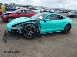 2022 Porsche Taycan 4S z VIN WP0AB2Y12NSA45396, wystawiony jako IAAI lot #41946433 z przebiegiem 9389 mil mil oraz . Historia ofert i sprzedaży dostępna na DreamBid. Obrazek 15.