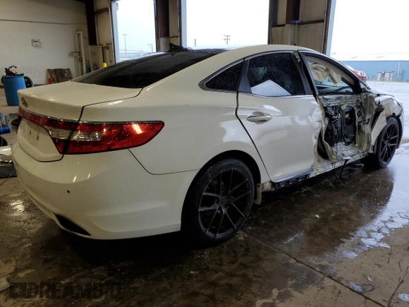 2013 Hyundai Azera z VIN KMHFH4JG0DA225049, wystawiony jako Copart lot #65530604 z przebiegiem 77 218 mil mil oraz Szkoda całkowita • Salvage title. Historia ofert i sprzedaży dostępna na DreamBid. Obrazek 3.
